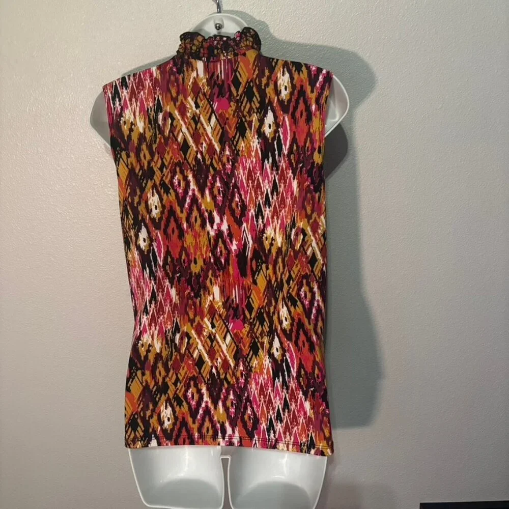 L Sere nade sleeveless multicolored turtlenecked blouse with diamond shapes